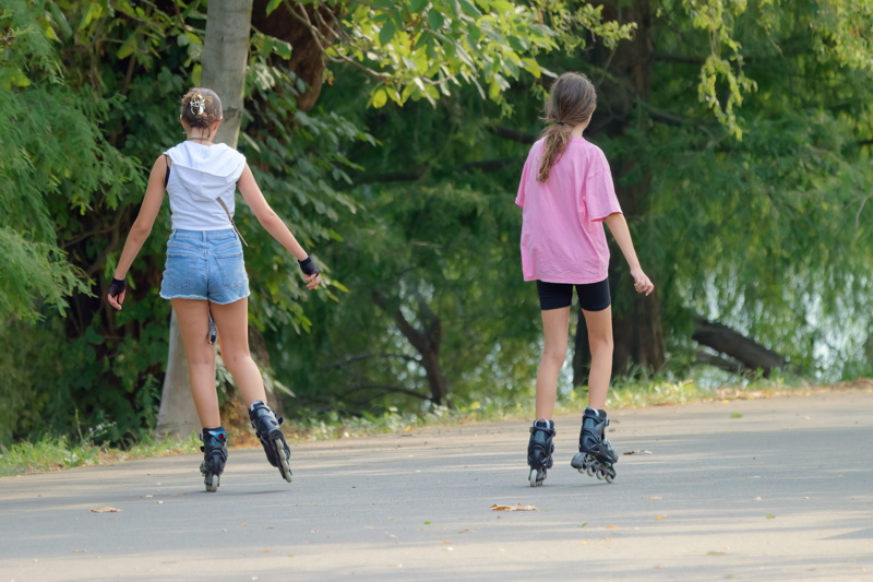 Girls rollerblading